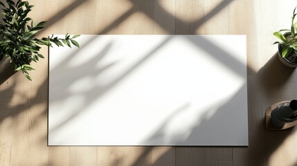 An areal view of a large white desk mat with black edges, soft shadows, commercial imagery, magazine aesthetic