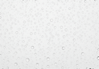 Rain Drops on Glass Surface Creating Abstract Pattern and Texture