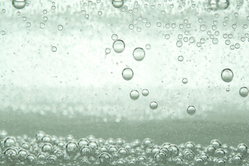 Refreshing soda water as background, closeup view