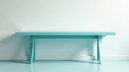A Light Teal Table Against a White Wall, Ideal for Displaying Products or as a Minimalist Design Element