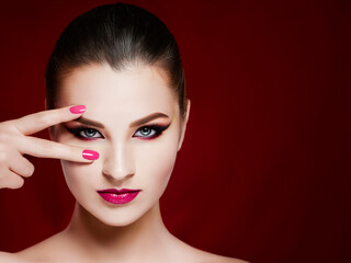 Generated image partially. Makeup and cosmetic concept image. Colorful makeup woman on red background. 