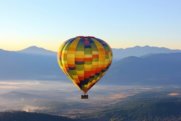 vibrant hot air balloon soars above scenic landscape on crisp clear morning with ample copy space