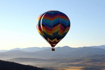 vibrant hot air balloon soars above scenic landscape on crisp clear morning with ample copy space