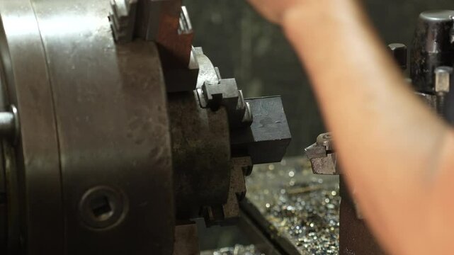 VDO 4K Lathe is working on turning metal parts for industrial use.