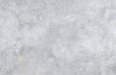 Light gray concrete surface with subtle texture, cracks, and stains, ideal for backgrounds and design elements.