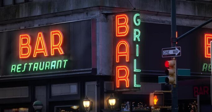 A nighttime exterior establishing shot of an unbranded bar and restaurant in downtown Manhattan, New York City. Day/Night matching available.  	