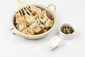  Fish cake soup is a food made by crushing fish flesh, adding additional ingredients such as salt, and cooking it to coagulate it.