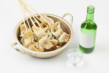  Fish cake soup is a food made by crushing fish flesh, adding additional ingredients such as salt, and cooking it to coagulate it.