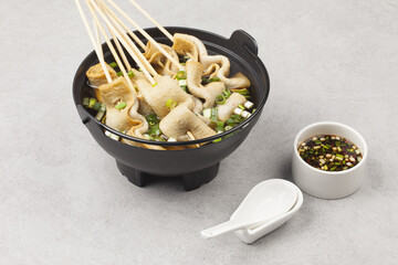  Fish cake soup is a food made by crushing fish flesh, adding additional ingredients such as salt, and cooking it to coagulate it.