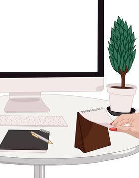 Minimalist Workspace with a Laptop and Green Plant