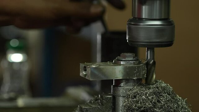 VDO 4K Lathe is working on turning metal parts for industrial use.