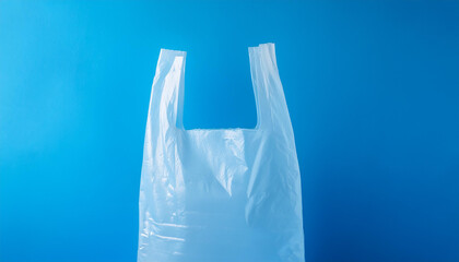 Mock up of white plastic bag on vivid blue background. Perfect for branding, product presentation