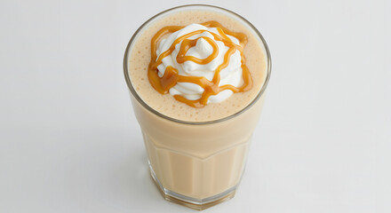 Overhead View of Caramel Milkshake, Sweet and Decadent, Topped with Whipped Cream and Caramel, Against a White Background