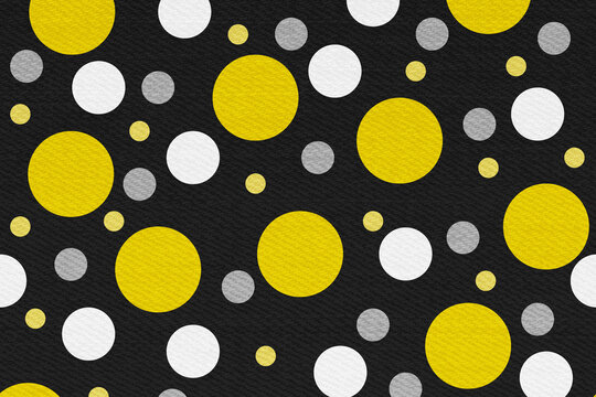 Yellow, black and white polka dot background