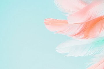 Naklejka premium feathers of varying colors and sizes drift gently against soft pastel backdrop creating ethereal abstract pattern