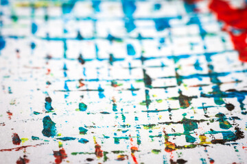 Naklejka premium Extreme close up of colorful acrylic paint texture showing brush strokes. Selective focus.
