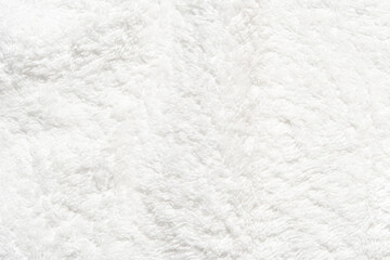 Soft plush white texture background for cozy winter ambiance and home decor design inspiration.