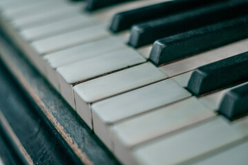 Nostalgic Well-Used Piano Keys in Dramatic Close-up View