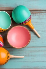 vibrant table set for cinco de mayo celebration with colorful mexican decorations and maracas offering ample copy space