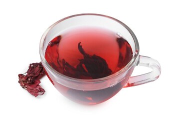 Delicious hibiscus tea in glass cup and dry roselle sepals isolated on white