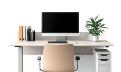 A computer and a sofa chair on the desk