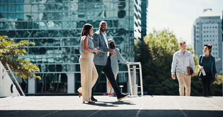 Business, employees and walking in city with discussion for corporate ideas, campaign planning and...