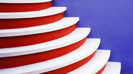 Abstract Red and White Curved Staircase Design Against Purple Wall