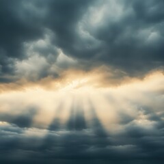 Obraz premium Dramatic Dark Clouds with Golden Sun Rays Breaking Through