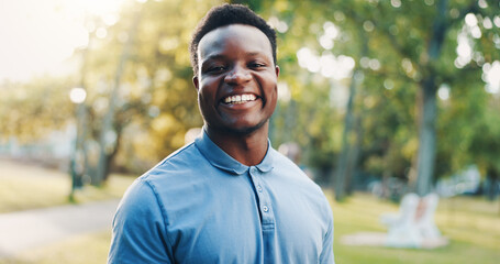 Happy, portrait and black man with park for wellness campaign, health and non profit organization in nature. Male person, environmentalist or conservationist with smile for eco friendly development