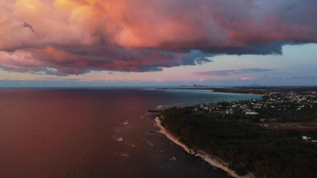 Aerial view in Mauritius over Pointe aux Piments beach at sunset, a beautiful tropical beach in the Indian Ocean