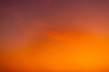 Orange sky background,Beautiful of luxury soft gradient orange gold clouds and sunlight on the blue sky perfect for the background, take in everning,Twilight