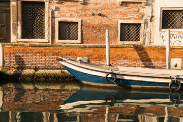 boat docked on the canal in Venice, Italy