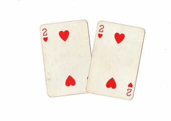 A pair of identical vintage playing cards on a white background.