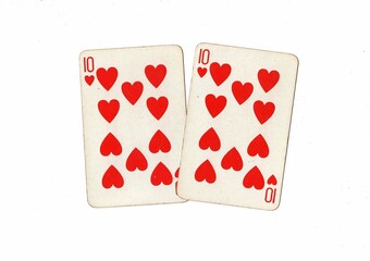 A pair of identical vintage playing cards on a white background.