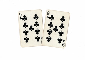A pair of identical vintage playing cards on a white background.