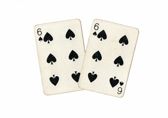 A pair of identical vintage playing cards on a white background.