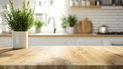 Close-up view of a wooden kitchen countertop with potted green plant on kitchen blur background. front view, light wood table top plank, empty space