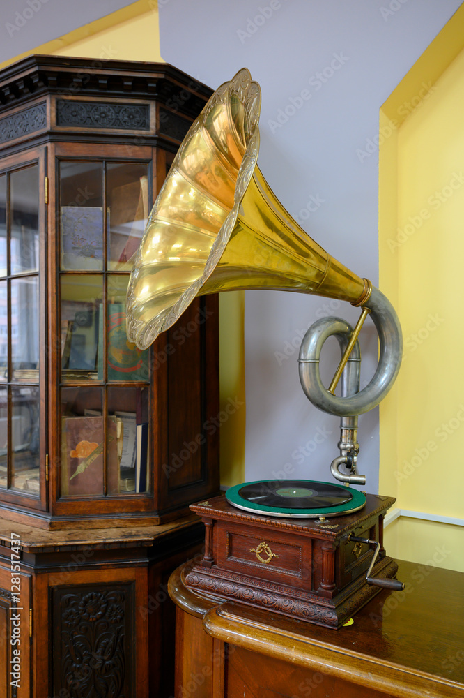 Wall mural A gramophone made in 1913 in Russia, with a large gilded trumpet