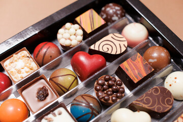 small chocolates with various shapes and colors