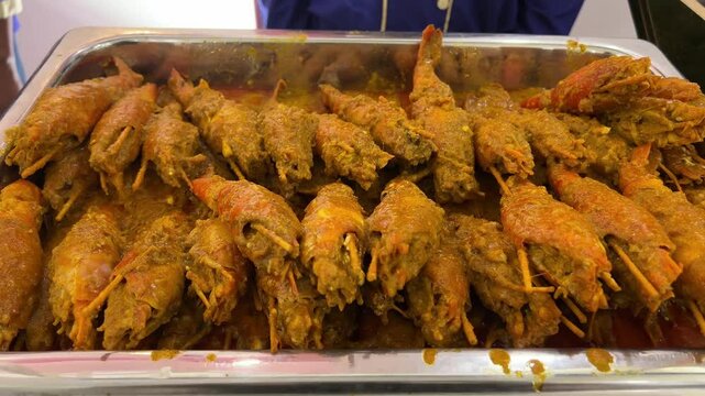 Galda chingri malai kari looking delicious.