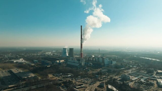 Coal power plant emits smoke into the atmosphere, highlighting air pollution concerns in the region