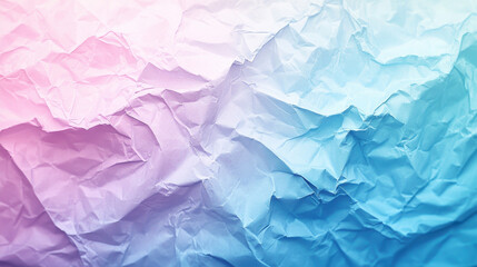 Crumpled paper texture in soft focus with gradient of pink and blue hues