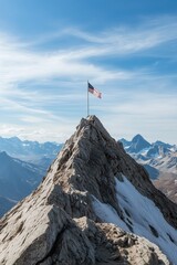 Rocky mountain peak with an American flag at the summit, surrounded by distant peaks under a blue sky. A symbol of achievement, perseverance, and success.

