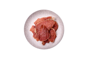 Jerky, dried pork meat slices with salt and spices