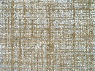 Close up texture of gold and white upholstery fabric, made of woven cotton and polyester. Micro linen knitted texture. Suitable for sofa, upholstery, curtain, and drapery. Seamless background fabric 