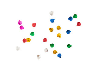 Colorful decorative shells scattered on transparency background create vibrant display