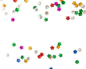 Colorful flower shaped beads scattered on transparency background create vibrant and playful atmosphere