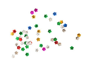 Colorful flower shaped sequins scattered on transparency background, perfect for crafts and decorations