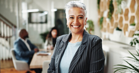 Happy, confident and portrait of mature businesswoman in office for real estate startup company. Pride, realtor and professional female luxury home consultant with positive attitude in workplace.