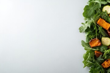 Fresh greens and assorted vegetables create vibrant, healthy bac